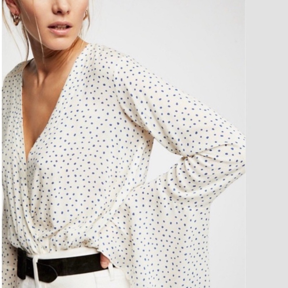FREE PEOPLE Makin
Waves Printed Bodysuit
Ivory